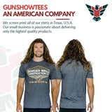 man wearing GunShowTees "official" build the wall Donald Trump Border Wall Construction tshirt - funny mens tees - navy heather
